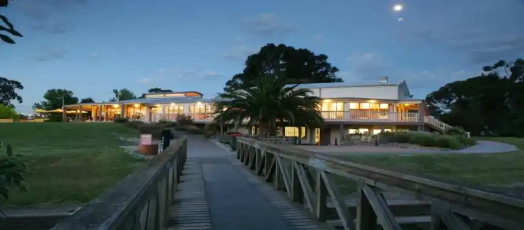 Riverside Golf and Sports Centre clubhouse at dusk, a low light CCTV environment